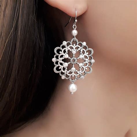 Boucles d'oreilles de luxe pour Femme .